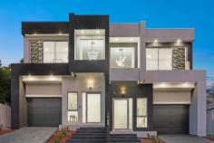 8A Wood Street Eastwood NSW 2122 The embodiment of contemporary style, this luxury brand new home enthralls with its inspired custom architect design accented with high ceiilngs and premium quality inclusions. Cleverly crafted to capture dazzling natural light, the home delivers a soaring void entrance unfolding to seamless flowing living zones and a low maintenance backyard. Poised on the high side of a quiet cul-de-sac, it's a walk to Five Ways shops and buses, while being in the esteemed Epping Boys High and Eastwood Heights Public School catchment.  - Gorgeous open plan living/dining zone with bi-folds to the backyard - Designer gas kitchen boasts Bosch appliances and full butlers' pantry - Beautiful bedrooms have backlit built-in robes, lower guest bedroom - Generous main bedroom offers elegant lighting and dressing table - Glamorous bathrooms on both levels feature brushed gold hardware - Main bathroom with a deep freestanding tub, ensuite has dual basins - Wide tiled foyer with tall glass windows and skylight on upper level - Ducted air conditioning, understair storage and automatic garage - 200 metres to buses and 400 metres to Eastwood Heights Public School - Number 8 a symbol of prosperity, fortune, wealth and positive energy. 