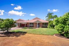  18 Tindals Crescent HANNANS WA 6430 Nestled in a quiet street, a stone’s throw to Karlkula Bush Reserve walking tracks, Hannans Primary School and Hannans Boulevard is this spacious family home. Consisting of 5 bedrooms, with ensuite to the main bedroom, and BIR’s to all remaining bedrooms, plus two separate living areas, there is enough room for a large family to enjoy! A well-appointed kitchen overlooks the meals area, with lots of beautiful natural sunlight. The best temperature all year round is controlled by ducted evap. heating and cooling for convenience. A double carport with side access to the backyard is perfect for extra vehicles and trailers, and a 5x3m2 powered workshop for all the tools and storage requirements. Lovely established lawns for the family to enjoy all situated on a 756m2 block. • Brick and Iron Home • Popular Hannans Location • 5 Bedrooms • 2 Bathrooms • Spacious Kitchen with electrical cooking appliances • 2 Living Areas • Patio perfect for entertaining • Ducted Evap. Heating and Cooling • Solar Panels • Electric HWS – near new • Ceiling Fans • 5x3m2 Workshop • Established Lawn and Gardens • 756m2 Block Size 