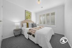  6 Coram Cl Narre Warren North VIC 3804 $970,000 - $1,067,000 A much-loved family home recently renovated and located in a private enclave. It offers four spacious bedrooms, each with built-in robes and new flooring and window coverings. The master suite is particularly impressive with a walk-in robe, Juliet balcony, and ensuite bathroom. The living areas are designed with an open-plan concept, allowing plenty of natural light to flow through the house. There is a private lounge area and an expansive family room that connects to a spacious meals area. The kitchen is a standout feature with striking gloss white cabinets, complemented by stone benchtops, stainless steel appliances, and a walk-in pantry. One of the highlights of the property is an elevated timber deck that opens from the living area. This outdoor space comes equipped with an outdoor fireplace, making it perfect for gatherings and enjoying the outdoors. The home is situated on a generous 3653m² allotment, providing ample space for the family to enjoy. Overall, this beautifully renovated family home offers a combination of modern amenities and a warm, comfortable atmosphere, with the opportunity to further enhance the yard. 