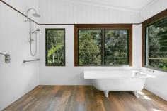  767 Trees Road Currumbin Valley QLD 4223 $1,995,000 10 Acre Natural Wonderland With Vast Coastline Views Dreaming of a tree change? Swap urban chaos for rural tranquillity and retreat to a 10 acre natural wonderland in Tallebudgera Valley. Hovering 300m above sea level and basking in spectacular views, a rolling tapestry of greenery sprawls out to meet the magnificent coastline, with the Pacific Ocean sparkling on the distant horizon. Co-existing in harmony with its surrounds is a charming mud brick home that speaks to the simplicity of life here among the treetops. Accessed by a newly sealed bitumen driveway, the exposed rock flooring, timber panelled walls and louvred windows reinforce the character of the unspoilt surrounds, while also keeping it naturally cool. Raked ceilings with timber beams and a feature mud brick wall enhance the earthy charisma in the lounge room, while the kitchen has been modernised with sleek white cabinetry and new appliances to complement the original stove. Two bedrooms and one bathroom grace the floorplan too, with the master bedroom offering enhanced peace and privacy via a private entry. A second bedroom features a built-in robe and handy direct access to a light-filled bathroom/laundry. There's ample room to relax on the outdoor deck that wraps around the side and the rear of the home, with flat grazing areas and a summer creek meandering through this lush bushland paradise as well. The 30kW solar system and a 50,000L water tank cater to an off-grid lifestyle, plus the home hosts a new and insulated 4-bay carport. There's even a cleared section overlooking Springbrook Mountain and Currumbin Valley, ready for you to build a second residence. Supremely peaceful and private, this idyllic oasis is conveniently just 11 minute's drive from Tallebudgera State School and shops/amenities (approx.), with beautiful beaches and coastal cafes of Palm Beach and Burleigh beckoning in 20 minutes (approx.). Experience the serenity, seclusion and enticing potential firsthand – arrange your inspection today. Main House Features 10 acre parcel of paradise with vast views stretching towards the coast Completely off-grid lifestyle on offer Charming mud brick and timber construction home Exposed rock flooring and louvre windows throughout Modernised kitchen with dual sink, 4 burner gas cooktop and oven, built-in pantry, original stove/oven and a 3-seater breakfast bar overlooking deck Lounge beneath 3.2m raked ceilings with exposed timber beams plus feature mud brick wall, wood fireplace, built-in cabinetry and sound system Master bedroom with louvre windows, storage room and private entry Bedroom 2 with built-in robe and access to light-filled bathroom/laundry Outdoor entertaining deck which wraps around half the home Other Features Cleared section for another building pad overlooking Springbrook Mountain and Currumbin Valley 30kW solar system with 60 panels Gas hot water New insulated four-bay carport Woodshed Shed with work bench and storage Flat grazing areas throughout the property Summer creek 50,000L water tank Located 300m above sea level Bitumen driveway, lined by a new concrete/rock retaining wall at the end section Location Approx. 11 mins to Tallebudgera State School and shops/amenities Approx. 15 mins to St. Andrew's Lutheran College Approx. 18 mins to The Pines, Elanora Approx. 19 mins to Palm Beach Approx. 20 mins to Burleigh Heads Approx. 20 mins to Currumbin Beach Approx. 26 mins to Gold Coast Airport Approx. 40 mins to Surfers Paradise 
