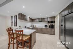  5 Talga Way Tapping WA 6065 $740,000 This stunning 4-bedroom, 2-bathroom residence is sure to capture your heart. Located opposite Castledene Park & with immaculate presentation throughout, this property is ready to move straight into & make your home. Features and benefits include: * Walled & gated frontage providing space for children & pets to play * Security screen to front door * Entrance hall * Master bedroom with walk in robe, security shutters, ceiling fan & ensuite with twin vanities, shower & WC * Sunken home theatre * Open plan family & meals areas with recessed ceiling, shoppers’ access from the garage, ceiling fans, security shutters & reverse cycle split system air conditioning * Stunning kitchen with breakfast bar, walk in pantry, double fridge / freezer recess, plenty of cupboard space & stainless-steel appliances * 3 further spacious bedrooms with built in robes & ceiling fans; 2 with security shutters & 1 with semi-ensuite access * Family bathroom with bath, shower & vanity * 2nd WC * Well-appointed laundry * Walk in linen closet * Alarm system * CCTV * 6.6kw approx. solar electricity system with a 5kw inverter (approximately 20 panels) * Bore reticulation * Large decked undercover entertainment areas with ceiling fans & built in BBQ & cooktop on mains gas * Side access with plenty of parking for the caravan, boat or trailer etc behind lockable gates * Double, remote garage * Extensive driveway with plenty of parking for extra cars, trailer, caravan etc * Large 628sqm block * Mature & established landscaped gardens providing a private oasis * Close to schools, transport, shops & all other local amenities 