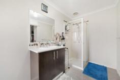  29 Mayesbrook Rd Manor Lakes VIC 3024 Presenting a residence that boasts three generously sized bedrooms, this property enjoys a prime location in close proximity to the Wyndham Train Station and local schools. The master bedroom is equipped with His and Her robes as well as an ensuite, and features such as a ceiling fan and hybrid wooden floors enhance the ambiance. With a focus on convenience, the double garage offers remote control access and internal entry. The kitchen, designed for spaciousness, is complete with modern amenities including a dishwasher and ample storage solutions. Additional highlights of this home include built-in robes in the second and third bedrooms, ducted heating, and evaporative cooling for year-round comfort. The outdoor area, designed for low maintenance living, features a concrete pathway, pergola, and a practical garden shed. 