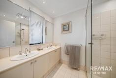  5 Talga Way Tapping WA 6065 $740,000 This stunning 4-bedroom, 2-bathroom residence is sure to capture your heart. Located opposite Castledene Park & with immaculate presentation throughout, this property is ready to move straight into & make your home. Features and benefits include: * Walled & gated frontage providing space for children & pets to play * Security screen to front door * Entrance hall * Master bedroom with walk in robe, security shutters, ceiling fan & ensuite with twin vanities, shower & WC * Sunken home theatre * Open plan family & meals areas with recessed ceiling, shoppers’ access from the garage, ceiling fans, security shutters & reverse cycle split system air conditioning * Stunning kitchen with breakfast bar, walk in pantry, double fridge / freezer recess, plenty of cupboard space & stainless-steel appliances * 3 further spacious bedrooms with built in robes & ceiling fans; 2 with security shutters & 1 with semi-ensuite access * Family bathroom with bath, shower & vanity * 2nd WC * Well-appointed laundry * Walk in linen closet * Alarm system * CCTV * 6.6kw approx. solar electricity system with a 5kw inverter (approximately 20 panels) * Bore reticulation * Large decked undercover entertainment areas with ceiling fans & built in BBQ & cooktop on mains gas * Side access with plenty of parking for the caravan, boat or trailer etc behind lockable gates * Double, remote garage * Extensive driveway with plenty of parking for extra cars, trailer, caravan etc * Large 628sqm block * Mature & established landscaped gardens providing a private oasis * Close to schools, transport, shops & all other local amenities 
