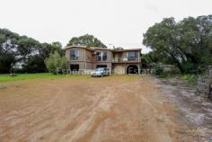 16 Barron Close Pink Lake WA 6450 $625,000 Tall trees surround this 6175sqm lifestyle property offering an abundance of space and being only 5km from town. The 2 storey, 4 bedroom, 2 bathroom home boasts large living areas and sizeable bedrooms with robes. Other features include; • Formal Lounge • Spacious kitchen/dining and family room • Tile fire and 2 x airconditioners • 50,000L rainwater storage • Bore with 7500L storage tank • Massive undercroft storage including double garage • Double carport/patio • Be impressed by the newly constructed 16m x 9m Colorbond shed with high and standard clearance access openings. High density concrete specifications allow for fixed plant safety options. A further 23,000L rainwater storage tank catches from this massive roofline. 