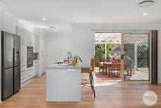  5 Charthouse Avenue Corlette NSW 2315 Situated in a quiet pocket in the family friendly suburb of Corlette and featuring a meticulously maintained façade, exuding a sense of tidiness and curb appeal, sits this ultimate single-level family home. Step inside and discover the epitome of comfort and modern living. The interiors are drenched in natural light which perfectly complements the calm colour palette and warm timber finish flooring to accentuate the spacious interiors. The layout flows seamlessly, with two distinct living areas that provide flexibility and space for various activities. The open-plan design enhances the sense of connectivity, allowing for easy interaction between the kitchen, dining, and living spaces. A sublime, contemporary kitchen fit with stainless steel appliances, crisp cabinetry, and an elegant island bench provides the ultimate space to entertain guests in a central hub. For those who love to entertain, the undercover entertainment area offers a picturesque setting to host gatherings, all while overlooking the expansive backyard. Boasting four generously sized bedrooms, each featuring built-in wardrobes and ducted air-conditioning, there's plenty of room for the whole family to reside in comfort while the two bathrooms, including an ensuite attached to the main bedroom, offer a perfect blend of original charm and cleanliness while you unwind after a long day. Situated in the peaceful enclave of Corlette, this home is a serene retreat from the bustling nature of everyday life, allowing you to relish the tranquillity of the surroundings. Experience the perfect blend of modern comforts and serene living in this exquisite property. Location, design, inclusions, functionality, luxury and quality - this home has it all and more! Approx. a 1km walk to Corlette Beach, there will be no excuses not to see the sunrise or sunsets. 