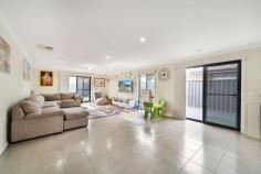  29 Mayesbrook Rd Manor Lakes VIC 3024 Presenting a residence that boasts three generously sized bedrooms, this property enjoys a prime location in close proximity to the Wyndham Train Station and local schools. The master bedroom is equipped with His and Her robes as well as an ensuite, and features such as a ceiling fan and hybrid wooden floors enhance the ambiance. With a focus on convenience, the double garage offers remote control access and internal entry. The kitchen, designed for spaciousness, is complete with modern amenities including a dishwasher and ample storage solutions. Additional highlights of this home include built-in robes in the second and third bedrooms, ducted heating, and evaporative cooling for year-round comfort. The outdoor area, designed for low maintenance living, features a concrete pathway, pergola, and a practical garden shed. 