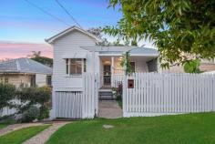  30 Price Street Wooloowin QLD 4030 Simply move in and enjoy this Queenslander cottage or consider the opportunity to add value with future improvements. The choice is yours. Rarely available, this circa 1920s workers cottage is located in a wide, tree lined street in the heart of Wooloowin. Popular Price St has enjoyed many recent renovations with lovingly restored character Queenslanders providing a charming streetscape in this family friendly street . With the home positioned forward on the lot, the property maximises rear garden space to create the sense of a larger than usual block. A northerly aspect from the rear captures warm winter sun and cooling summer breezes into this very private garden, a wonderful space for children's play and casual entertaining. Inside, high ceilings, original timber flooring, vertical joinery & double sash windows combine with a large kitchen, separate dining room, generously proportioned bedrooms and air conditioning for new owners to enjoy. Close to cafes, shops & transport, 30 Price St showcases all the much loved features of the character Queenslander home in a city fringe position, just 6km from Brisbane CBD. Features include: Preferred Northerly aspect at rear Large kitchen with gas cooktop, electric oven, dishwasher Separate dining room Air conditioning & ceiling fans Timber floors, high ceilings Insect/security screens 3 bedroom Family bathroom VJ's, double sash windows Car parking for 2 vehicles off street Wide side access to large rear garden Large rear garden Secure storage under Potential for future extension (subject to BCC council approval) Rail stations & Lutwyche Bus Interchange close by Coles Woolworths, Aldi & specialty shops at Market Central Cafes, restaurants, shops & services all available Albion Village lifestyle precinct on the doorstep A range of childcare, state & private schools Wooloowin State School & Kedron High School catchment Bike & walking tracks at Kedron Brook, Melrose & Kalinga Parks Land 405m2, fully fenced Short drive to Inner City Bypass, M1Gateway Motorway & Brisbane Airport 6km to Brisbane CBD The popular suburb of Wooloowin is supported by a strong community & all the services, transport & facilities required for modern living. Cafes, shops, restaurants & parks are all an easy walk away whilst Wooloowin Rail Station & Lutwyche Bus Station offer short daily commutes for city workers to enjoy. Hectares of parkland, quality childcare centres and schools are all close at hand whilst the Gateway arterial & inner-city bypass ensure easy access across the city and beyond. 