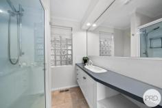  1 / 3 Jade Court Blackmans Bay TAS 7052 $695,000 - $755,000 Welcome to this beautiful townhouse, tucked away in a cul-de-sac location and offering an ideal low-maintenance lifestyle for those seeking ease and convenience. As you step inside, you'll immediately notice the move-in-ready condition of the home, featuring brand new carpets and fresh paint throughout. The thoughtfully designed open-plan living area boasts abundant windows, bathing the space in natural light and creating a warm and inviting atmosphere. The use of ample windows means you can enjoy the calming water outlook from each space of the living. The kitchen is a true delight for those who love to entertain. Open to the dining area, with a feature wall that adds style to the room, allowing you to engage in conversations with guests or family with ease. There is plenty of bench space, ample cupboards, a wall oven and gas hot plates - the design of the kitchen makes meal preparation a breeze. The property comprises three well-appointed bedrooms, including a master suite with its own ensuite bathroom and picturesque water views, offering you a private and comfortable space. Additionally, there's a versatile room downstairs that presents a range of possibilities to suit your lifestyle needs (STCA). Whether you need a hobby room, a fourth bedroom, or a teenagers' retreat, this space has the potential to adapt to your requirements. Moreover, if you prefer a garage, it can be easily converted back to serve that purpose. The outdoor yards are low-maintenance while providing space for kids or pets to play securely. Position with only one other townhouse and within minutes away from the Hill Street shopping complex, and on a bus route. 