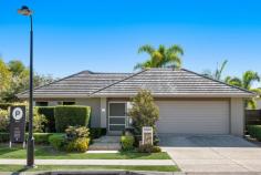  79 Watervale Parade Wakerley QLD 4154 Perfect for families, entertainers, investors and those seeking single-level living, this four-bedroom home on a 597sqm allotment is only minutes from Manly’s waterfront attractions. Also close to local conveniences and esteemed schools, this exceptional property features lush tropical gardens and beautiful interiors. Making a brilliant first impression with its attractive facade and mature front gardens, the residence includes: - Elegant tiled and carpeted floors, as well as a versatile neutral colour palette, plantation shutters and lofty 2.71-metre-high ceilings - Spacious open-plan living and dining area bathed in natural light, plus a connecting lounge space - Immaculate adjoining kitchen displaying a breakfast bar, quality appliances including 6 burner gas cooktop and ample cupboard storage - Fully-fenced grassed side yard benefitting from flourishing gardens, a large patio, linked timber decks and a luxurious Jacuzzi - Ensuited master bedroom encompassing dual built-in robes - Three additional bedrooms also showcasing built-in robes - Well-appointed main bathroom with a separate bath, shower and toilet - Internal laundry and fantastic storage - Secure dual garage - Ducted air-conditioning, ceiling fans and new carpeted floors in the front living area - Crimsafe security screens throughout - 5kw solar with 24 panels A stone’s throw from a multitude of shops and dining options, this sensational home is near Mayfair Village on Manly Shopping Centre and the Lota train station. The Queen Victoria Boat Ramp, Manly Boat Harbour, Wynnum Wading Pool, Pandanus Beach and the Wynnum Jetty are also easily accessible from this address. Falling within the Gumdale State School and Wynnum State High School catchment areas, this outstanding property is also a short distance from Agnew School, Moreton Bay College and Moreton Bay Boys’ College. 