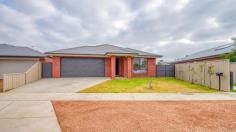  13 Carrick Crescent Nagambie VIC 3608 This three-bedroom brick veneer home offers a comfortable and convenient lifestyle. Situated on a generous land area of 882 sqm, this property is perfect for families and individuals alike. Located in a quiet location, this property is walking distance to local schools, kindergarten, shops, and Lake Nagambie. Step inside and be greeted by a spacious and well-designed interior. The house features a range of desirable attributes including ceiling fans and built-in robes to all bedrooms with a walk in robe to the master bedroom, floorboards throughout and Mitsubishi split system air conditioning in the main living area and master bedroom. The exterior of the property includes a fully fenced yard with rear access gates, irrigation system and a large 10mx6m shed offering ample storage space for all your belongings. In addition, the property includes solar hot water, reducing your carbon footprint while enjoying the benefits of energy-efficient living. Don't miss out on the opportunity to make this house your dream home. 