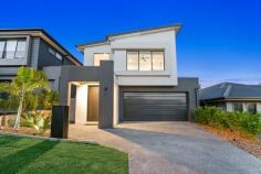  20 Tess Rd Coomera QLD 4209 Architect designed with bespoke qualities, this unrivalled 4 bedroom + study 2 bathroom entertaining sensation has been engineered to create a home of tailored luxury, showcasing a timber stairwell, a study, stunning living and dining areas kitchen (butler's pantry, ensuite and custom dressing room) and a sumptuous pool. Warm and welcoming with clever design sensibility, it reveals beautifully appointed interiors enhanced by its stylish neutral decor, stone benchtops and sunlit interiors that make this home one you will never want to leave. A grandly proportioned open plan layout offers the perfect environment for families without skimping on luxury, superior quality and entertainment excellence. This home is a sublime fusion of contemporary style and living needs with an open plan living area, four well-proportioned bedrooms and a seemingly endless supply of storage. • 4 generous sized bedrooms • 2 bathrooms • Plus downstairs powder room • Master bedroom with extra large walk in robe and Ensuite • Plungie Pool by Plungie Pool Aus • Stone Benchtops from Stone Ambassador • Energy efficient down lights throughout • Hybrid flooring throughout • Large entry door • 350m to Picnic Creek State School • 1.4km to St Josephs College • Local parks and playground • Plenty of walking paths to explore • Approximately 6 minutes to the Highway and 5 minutes to the Coomera Train station • Bus route is close by allowing access to the public transport network • 33 minutes to Surfers Paradise and approximately 40 minutes to Brisbane and Coolangatta 