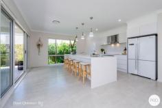  16 Wulung Street Corlette NSW 2315 Situated in the highly sought after 'Vantage Estate', this single level, north facing home effortlessly blends modern aesthetics with convenient living and is sure to tick all the boxes! Beautifully landscaped grounds and gardens frame the fresh & clean façade and set the tone for the contemporary elegance that awaits inside. You will be captivated by the seamless and expansive, open-plan layout in the heart of the home, which makes entertaining your family & friends in a central hub a dream! Find yourself creating culinary delights for your guests in the impressive kitchen which boasts a stone island bench, quality appliances and plenty of cupboard space. For those seeking relaxation, the undercover entertaining area presents the perfect setting for hosting friends and family, rain or shine. The backyard features a beautifully maintained lawn surrounded by fully landscaped gardens, providing a serene escape for both play and entertainment - If you're looking for a touch of luxury, a spa adds a touch of indulgence to your outdoor retreat. This home boasts not one, but three distinct living areas including a luxurious home theatre. The main living area exudes warmth and comfort, while the dedicated theatre room promises the ultimate cinematic experience within the comforts of your very own home. A separate living area, which could easily serve as a teenage retreat, offers versatility and privacy for every member of the family and means that you can comfortably accommodate everyone with ease. The expansive proportions continue into the four bedrooms of accommodation with the enormous main bedroom serving as the perfect private sanctuary. Equipped with air conditioning and timeless plantation shutters, this bedroom is an oasis of comfort. The ensuite is a masterpiece of design and practicality, featuring "his and hers" sinks that add a touch of convenience to your daily routine. The remaining three bedrooms are equally inviting, each boasting air conditioning, ceiling fans, and plantation shutters. A study adds a versatile space to the home, with the option to effortlessly convert it into a fifth bedroom according to your needs. The main bathroom, with its timeless design, offers both a large shower and a relaxing bath, catering to your every preference. This home is a haven of modern living with a touch of luxury and functionality. From the open-plan living spaces to the lush outdoor retreat and double garaging, every detail has been carefully considered. With its impeccable design and prime features, all that's left for you to do is pack your bags and move in - your perfect lifestyle awaits! 