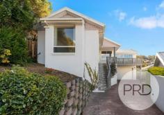  1 / 3 Jade Court Blackmans Bay TAS 7052 $695,000 - $755,000 Welcome to this beautiful townhouse, tucked away in a cul-de-sac location and offering an ideal low-maintenance lifestyle for those seeking ease and convenience. As you step inside, you'll immediately notice the move-in-ready condition of the home, featuring brand new carpets and fresh paint throughout. The thoughtfully designed open-plan living area boasts abundant windows, bathing the space in natural light and creating a warm and inviting atmosphere. The use of ample windows means you can enjoy the calming water outlook from each space of the living. The kitchen is a true delight for those who love to entertain. Open to the dining area, with a feature wall that adds style to the room, allowing you to engage in conversations with guests or family with ease. There is plenty of bench space, ample cupboards, a wall oven and gas hot plates - the design of the kitchen makes meal preparation a breeze. The property comprises three well-appointed bedrooms, including a master suite with its own ensuite bathroom and picturesque water views, offering you a private and comfortable space. Additionally, there's a versatile room downstairs that presents a range of possibilities to suit your lifestyle needs (STCA). Whether you need a hobby room, a fourth bedroom, or a teenagers' retreat, this space has the potential to adapt to your requirements. Moreover, if you prefer a garage, it can be easily converted back to serve that purpose. The outdoor yards are low-maintenance while providing space for kids or pets to play securely. Position with only one other townhouse and within minutes away from the Hill Street shopping complex, and on a bus route. 