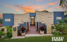  64 Kingsview Dr Umina Beach NSW 2257 $1,600,000 - $1,700,000 Located in one of the most desirable areas of Umina Beach, this house is set in the tranquil hills of Umina Heights. Boasting breathtaking views of Brisbane Waters and the surrounding bushland this recently completed home with dual living potential will suit an array of buyers. Entertaining your guests in style is easy with multiple living areas, a separate dining area and large timber deck offering stunning water and bush views. The kitchen has plenty of storage with an island bench and butlers pantry. The home boasts 6 large bedrooms all with robes, plus a study, landscaped gardens and a large double garage. This property is ideally located to give easy access to local conveniences, such as Umina and Ettalong Beaches, local shopping centres and Woy Woy railway station. Other features of this impressive family home include - - Separate upstairs and downstairs living! - Level access - Air-conditioning - Fireplace - Double garage with automatic door, work bench + additional storage area - Large timber entertaining deck, with sweeping views - Close to local bush walking tracks 