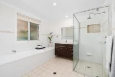  4 Paperbark Cl Wyoming NSW 2250 Occupying a top spot within a tranquil, leafy cul-de-sac, this picture-perfect family home ticks all the boxes! Capturing a sunlit Northerly aspect and set against a lush green backdrop of established trees, an immaculate brick and colorbond exterior opens into fresh, recently upgraded interiors before spilling out to a full-length timber deck and superb al fresco entertaining zone adjoining a fully fenced backyard – the ultimate flow for a fabulous spring and summer ahead. Perfectly equipped to cater to all the demands of modern living, a single-level floorplan encompasses multiple living zones centring around a sleek gourmet kitchen, along with three light-filled bedrooms, a stylish family bathroom, and an abundance of storage space. A fantastic home and a great address with local schools, shops, parks, and playgrounds all just minutes away – make your move fast on this one! Features: – Scenic and serene position within a tranquil, tree-lined cul-de-sac. – Single-level brick and tile family home showcasing a suite of significant recent upgrades – from a brand new roof, gutters, and fascia and sparkling new LED downlights throughout key living areas and easy-care ‘Rosegum’ vinyl flooring. – Spacious gourmet kitchen set to be the chef’s delight, offering an abundance of bench space, natural gas cooking facilities, crisp white cabinetry, and quality appliances including a 5-burner gas stove, electric oven, and LG dishwasher. Ideally positioned at the heart of the home, with a convenient view across both the front and back yards. – Multiple living areas include an inviting formal lounge and a separate, open-plan main social zone encompassing the kitchen, dining, and second living areas before spilling out to a full-length covered back deck, paved patio, and fully fenced backyard. A fantastic family-friendly flow with room to move and space for everyone to relax, play, or entertain. – Three generously proportioned bedrooms all with built-in robes. – Sleek and stylish family bathroom with built-in tub, quality fixtures, and a conveniently separate WC – perfect for busy family living. – Large combined laundry and workshop area with bonus additional WC. – Single lock-up garage and additional off-street parking for a further 3 vehicles. Extras include: air conditioning (second living), linen press, bonus underhouse storage area, garden shed, rainwater tank with pump for auto-watering gardens (backyard) and provisions for kitchenette (gas and water) to paved entertaining area. Offering a full suite of suburban amenities, Wyoming has everything you could need, from reliable public transport and a quality selection of schools to a buzzing local shopping village, with the added bonus of easy access to every lifestyle attraction on the coast. A short drive will take you to Gosford CBD, the waterfront and iconic new play park, or the shopping mecca of Erina Fair, while Terrigal and Wamberal beaches are just 20 minutes away. For those heading further afield, the M1 motorway is also close by, offering seamless connection through to Sydney, Newcastle, and beyond. 