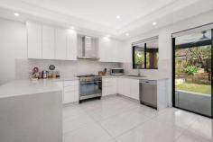  249A Northam Avenue Bankstown NSW 2200 This modern masterpiece is truly in a class of its own, owner built and designed to maximise natural light and internal floor space, there is not another designer home on the market which compares. With no expense spared and a meticulous attention to detail, this double brick family home offers four generous bedrooms, multiple living areas, high end finishes and potential to add more value as its huge backyard offers granny flat potential (STCA). Intelligently designed, this home has an abundance of natural light. At night this home becomes a whole new beast, fitted with an array of ambient light fittings both inside and out. The beautifully lit home includes: Three metre ceilings Single lock-up garage Ducted air-con throughout Presented in Natural Stone Marble Staircase Centrally located close to Bankstown local shops, cafes, public transport, schools and amenities, you do not want to miss out on this once in a lifetime opportunity. 