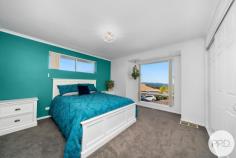  1 / 3 Jade Court Blackmans Bay TAS 7052 $695,000 - $755,000 Welcome to this beautiful townhouse, tucked away in a cul-de-sac location and offering an ideal low-maintenance lifestyle for those seeking ease and convenience. As you step inside, you'll immediately notice the move-in-ready condition of the home, featuring brand new carpets and fresh paint throughout. The thoughtfully designed open-plan living area boasts abundant windows, bathing the space in natural light and creating a warm and inviting atmosphere. The use of ample windows means you can enjoy the calming water outlook from each space of the living. The kitchen is a true delight for those who love to entertain. Open to the dining area, with a feature wall that adds style to the room, allowing you to engage in conversations with guests or family with ease. There is plenty of bench space, ample cupboards, a wall oven and gas hot plates - the design of the kitchen makes meal preparation a breeze. The property comprises three well-appointed bedrooms, including a master suite with its own ensuite bathroom and picturesque water views, offering you a private and comfortable space. Additionally, there's a versatile room downstairs that presents a range of possibilities to suit your lifestyle needs (STCA). Whether you need a hobby room, a fourth bedroom, or a teenagers' retreat, this space has the potential to adapt to your requirements. Moreover, if you prefer a garage, it can be easily converted back to serve that purpose. The outdoor yards are low-maintenance while providing space for kids or pets to play securely. Position with only one other townhouse and within minutes away from the Hill Street shopping complex, and on a bus route. 