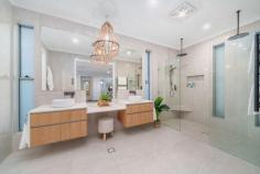  14 Allenby Close North Lakes QLD 4509 $1,589,000 Indulge in the pinnacle of luxury living with this exquisite home situated in the prestigious Allenby Close, North Lakes. Meticulously designed and flawlessly executed, this property offers an unparalleled standard of living for the discerning buyer. Step inside this freshly painted masterpiece and be greeted by an expansive 51.5 square home, boasting grandeur and sophistication at every turn. With 9ft ceilings both upstairs and downstairs, this residence provides a sense of spaciousness and freedom that is truly unrivalled. The accommodation is nothing short of extraordinary, with four extra-large bedrooms offering ample space for relaxation and rejuvenation. The parents' suite is a haven of tranquillity, complete with a private lounge room and balcony, overlooking the picturesque surroundings. Indulge in the luxury of a 11ft ceiling soundproofed cinema room, perfect for entertaining guests or enjoying a quiet night in. No expense has been spared in the creation of this opulent abode. The ultra-modern family bathroom features a spa, providing the ultimate sanctuary for relaxation. The enormous living area seamlessly flows into the raked outdoor entertainment area, creating a harmonious blend of indoor and outdoor living. Prepare culinary delights in the modern entertainer's kitchen, equipped with a walk-in pantry and top-of-the-line stainless steel appliances, including a Smeg gas cooktop and range hood. The entire home is adorned with LED lighting, creating a warm and inviting ambiance. The features of this property are truly exceptional. The parents suite boasts a grandeur walk-in robe with custom cabinetry with feature strip lighting, while the renovated ensuite exudes elegance and sophistication. Enjoy the breathtaking reserve aspect from the master suite balcony. This home is packed with luxurious extras, including a square set bulkhead in the kitchen, 3-step cornices throughout, and stone benchtops in the bathroom and kitchen. The triple garage features remote-controlled doors and freshly painted epoxy flooring, with a generous hardstand area for apron parking. Embrace the resort-style living with a 54,000-litre saltwater pool, complete with LED pool lights for a mesmerizing evening ambiance. The timber sun lounge deck with fireplace and hot & cold outdoor shower adjacent to the pool offer the perfect place to unwind and soak up the sun. The terrace area with a raked ceiling provides shade in summer and sun in winter, ensuring year-round comfort. This property is not only luxurious but also offers security and convenience. With features such as 2400mm high feature internal doors, acoustic insulation between floors and internal walls, and a CCTV and security alarm system, your peace of mind is assured. The ducted vacuum system, Rinnai Infinity gas hot water systems, 36 panel solar system and extensive audio/visual wiring further enhance the modern living experience. Enjoy the benefits of a low-maintenance manicured garden and lawns, allowing you to spend more time enjoying the finer things in life. This quiet, no-throughfare street is surrounded by other quality homes, ensuring a serene and prestigious living environment. Don't miss this rare opportunity to secure your dream home in Allenby Close, North Lakes. Contact us today for a private viewing and experience the epitome of luxury living. 