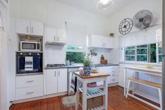  30 Price Street Wooloowin QLD 4030 Simply move in and enjoy this Queenslander cottage or consider the opportunity to add value with future improvements. The choice is yours. Rarely available, this circa 1920s workers cottage is located in a wide, tree lined street in the heart of Wooloowin. Popular Price St has enjoyed many recent renovations with lovingly restored character Queenslanders providing a charming streetscape in this family friendly street . With the home positioned forward on the lot, the property maximises rear garden space to create the sense of a larger than usual block. A northerly aspect from the rear captures warm winter sun and cooling summer breezes into this very private garden, a wonderful space for children's play and casual entertaining. Inside, high ceilings, original timber flooring, vertical joinery & double sash windows combine with a large kitchen, separate dining room, generously proportioned bedrooms and air conditioning for new owners to enjoy. Close to cafes, shops & transport, 30 Price St showcases all the much loved features of the character Queenslander home in a city fringe position, just 6km from Brisbane CBD. Features include: Preferred Northerly aspect at rear Large kitchen with gas cooktop, electric oven, dishwasher Separate dining room Air conditioning & ceiling fans Timber floors, high ceilings Insect/security screens 3 bedroom Family bathroom VJ's, double sash windows Car parking for 2 vehicles off street Wide side access to large rear garden Large rear garden Secure storage under Potential for future extension (subject to BCC council approval) Rail stations & Lutwyche Bus Interchange close by Coles Woolworths, Aldi & specialty shops at Market Central Cafes, restaurants, shops & services all available Albion Village lifestyle precinct on the doorstep A range of childcare, state & private schools Wooloowin State School & Kedron High School catchment Bike & walking tracks at Kedron Brook, Melrose & Kalinga Parks Land 405m2, fully fenced Short drive to Inner City Bypass, M1Gateway Motorway & Brisbane Airport 6km to Brisbane CBD The popular suburb of Wooloowin is supported by a strong community & all the services, transport & facilities required for modern living. Cafes, shops, restaurants & parks are all an easy walk away whilst Wooloowin Rail Station & Lutwyche Bus Station offer short daily commutes for city workers to enjoy. Hectares of parkland, quality childcare centres and schools are all close at hand whilst the Gateway arterial & inner-city bypass ensure easy access across the city and beyond. 