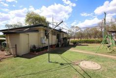  161 Rainbow Street Biloela QLD 4715 $259,000 This cosy home offers a blend of comfort and practicality and is situated on a generous 913sqm* corner allotment, within walking distance to local Schools and Sporting Fields. Whether you are looking to invest or an affordable home to occupy, this property presents an attractive opportunity. Features include: Combined kitchen and dining room with an electric freestanding stove. Separate, carpeted living room with air-conditioning. Three bedrooms with split-system air conditioners. Two bedrooms with built-in wardrobes. Ceiling fans throughout. Functional bathroom with a shower and toilet. Under covered timber deck with privacy roll down blinds. External secured laundry. 9x6m powered shed with a double carport awning, as well as two separate lawn lockers. 4.6KW solar system. Security screens throughout. Fully fenced yard with established lawns, gardens and hedging along the boundary for privacy. 2700L rainwater tank. Roof replaced in 2016. 