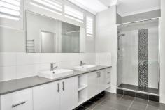  11 Gum Nut Ave Dawesville WA 6211 $749,000 Welcome to this meticulously designed 4-bedroom, 2-bathroom family home that is sure to exceed your expectations. Nestled in a tranquil neighborhood, this residence offers a perfect blend of modern living and thoughtful functionality. As you step inside, you'll immediately notice the wide and spacious entry guiding you to the heart of this home - a modern kitchen boasting an enormous bench space and a convenient walk-in pantry. The open-plan layout seamlessly connects the kitchen, dining, and living areas, creating an inviting and spacious atmosphere opening onto the alfresco for family gatherings and entertaining. High ceilings throughout the home add an element of grandeur, while the zoned air conditioning ensures year-round comfort. Whether you're working from home or need a quiet space for study, this property has you covered with a separate study and a dedicated theatre room. Additionally, there's an extra study nook conveniently located off the minor bedrooms, providing versatility and space for all your needs. Storage won't be a concern in this home, as it features multiple storage spaces, including a practical mudroom off the garage, making organization a breeze. The third garage/workshop with drive-through access and side access offers ample room for your hobbies and projects, caravan or boat. Step outside to discover your own oasis - a sparkling saltwater pool with a mesmerizing water blade feature. It's the perfect spot to unwind, cool off, and enjoy the outdoors with family and friends. In summary, this well-thought-out family home combines modern amenities, spacious living areas, and smart design elements. With its abundance of storage, multiple study spaces, and a fantastic outdoor area featuring a saltwater pool, this property truly offers a lifestyle of comfort, convenience, and luxury.  