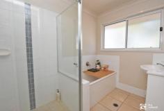  5 Panorama Dr Biloela QLD 4715 $295,000 Whether you're seeking a lucrative investment opportunity or planning to upgrade your family's living space, this 4-bedroom brick residence is a compelling choice. Nestled in a cul-de-sac on Panorama Drive, this property boasts a sprawling 1046m2 fully fenced allotment, offering plenty of room for children to frolic and play. Step into modern elegance with this thoughtfully designed home. The open-plan living area welcomes you, featuring sliding doors that seamlessly connect to a patio overlooking the yard—a perfect canvas for gardening enthusiasts. The kitchen is functional, complete with ample storage, a large pantry, dishwasher, and a breakfast bar that tastefully separates it from the living and dining area. All four bedrooms are equipped with built-in wardrobes, and the master bedroom boasts an ensuite for added convenience. Climate control is a breeze, thanks to the home's full air-conditioning system and ceiling fans. Parking is hassle-free with the inclusion of a spacious double lock-up garage. 
