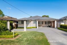  24 Rosemont Ave Emu Plains NSW 2750 $1,250,000 - $1,350,000 Located in a highly sought after pocket of Emu Plains this much loved and beautifully renovated family home rests in a quiet street surrounded by other quality homes. Boasting 5 bedrooms, all with built in robes and ensuites to both the master and large 5th bedroom/in-law accommodation. The open plan kitchen, living and dining area flow effortlessly onto the enormous outdoor undercover living area, private yard and sparkling inground pool. Separate access to the 5th bedroom provides the opportunity for inlaw/teenage living or possible office/home business (STCA). Located just minutes from parks, Nepean River, schools, shops, walking distance to Emu Plains station and easy access to the M4 motorway. This home offers a rare opportunity for large or blended families and could be the one you have been waiting for. Call us today to arrange your inspection. * Land size approx. 739.8sqm * Fully fenced private yard, heated inground pool, huge undercover outdoor living area * Quiet street, easy access to Nepean River, parks, Lennox shopping centre, schools, Emu Plains railway station & M4 motorway * Fully renovated kitchen with stone benchtops, glass splashback & gas cooking, separate access to adaptable in-law/teenage/office space, security alarm & cameras * Fully renovated family bathroom with freestanding bath and 2 ensuites, modern flooring, ducted air conditioning with 6 zones, attic storage, ceiling fans, solar panels 
