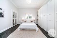  22 Murray Street Wagga Wagga NSW 2650 The perfect story book composition - meticulously restored red brick enhanced by a gorgeous palette of fine touches and charming character. Ideally located within Wagga's medical precinct, is this pretty, four-bedroom red brick cottage. An empathetic and stylish renovation has completed the home for modern family life while affectionately respecting its heritage roots. Subtle neutral colours marry with the original timber flooring and windows. The kitchen, dining and living is airy and sunlit, with high ornate ceilings and stunning timber floors. Ducted reverse cycle heating and cooling throughout and plantation shutters filter light, screening the comings and goings of the street. The front yard gifts peaceful glimpses of verdant green. This is a gorgeous nook for morning coffee or equally a blissful stage for an evening glass or two. The kitchen is well appointed, with generous stone countertops, two-pac cabinetry and ample storage, think easy meals with lots of room for family communion around the dining table. Four generous bedrooms, three with built-in-robes and leafy aspects. Family bathroom extends retreat vibes. Master features a stunning ensuite. The private rear yard is a perfect home for kids to play, whilst you entertain with friends and family. Rear lane access from Doris Roy lane, which is only used for local homeowners flows to a shed that most men will envy, four car accomodation with power. 22 Murray Street is the whole package. With nothing left to do, you can unpack, sit back and relax.  