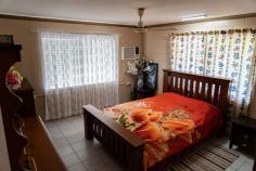  177 Valmadre Rd Moresby QLD 4871 $830,000 Fantastic lifestyle property, 17 kilometres from Innisfail, on 16.5 acres with a 4-bedroom house. One must inspect this property, With fenced cow paddocks, fruit trees, cocoa trees, Christmas trees, landscaped gardens, a fish pond, a large glasshouse, a lockable 2-phase powered shed at the back of the house, and a farm shed, this immaculately maintained home is situated on 16.5 acres. As you entertain on the spacious front patio and savour the view, you will feel as though you are on top of the world. The only restriction is your imagination. This property is perfect for growing small crops. Adding to the already planted cocoa trees and Christmas trees, you could diversify and grow other crops like bananas, passion fruit, or pawpaws. It will seem like you are living in paradise when you are on this magnificent property. Create a lifestyle for the whole family. Country living at its best. Located on an elevated block, the location is breathtaking. Owning a private creek that runs through your land is a rare find. It is the perfect place to sit around your fire pit and take in the view of the fresh waters, or get together in the hotter months with family and friends and go swimming in complete seclusion while knowing that no one else is around. If you have a boat or a jet ski, Mourilyan Harbour and boat ramp are just a 10-minute drive away, and from there you can access the Islands and excellent fishing locations. Our local coastline provides access to a variety of breathtaking beaches; just a few that are well worth the trip are Etty Bay Beach, which is patrolled and netted in the summer, Cowley Beach, Kurrimine Beach, and Mission Beach, to name a few. Water is not an issue thanks to a 2.5 hectare water licence, a diesel pump, and a boar. In addition to the land, the sale includes a Ford 5000 2wd tractor, a 6 ft slasher, rotary hoe, a 500-litre Mister, a 600-litre spray tank, and a Vycon Fertilizer spreader. The vendors have planted 120 Christmas trees, for future sale upon maturity, Cocoa trees as well as seedlings ready for transplanting. A truly spectacular property with peace and quiet guaranteed. FEATURES: * 4 BEDROOMS - MASTER WITH ENSUITE AND WALK-IN ROBE * MODERN KITCHEN * AIRCONDITIONED THROUGHOUT * 6 CAR ACCOMMODATION * GREEN HOUSE * FULLY LOCKABLE POWERED 9 X 7.5 M SHED AT REAR OF HOUSE - (2-PHASE POWER) * FARM SHED WITH LOADING RAMP FOR A FRUIT TRUCK * BEAUTIFULLY LANDSCAPED GARDENS AND YARD WITH FRUIT TREES * 120 CHRISTMAS TREES * COCOA TREES AND SEEDLINGS * LARGE FISH POND * LARGE ENTERTAINMENT AREA * ELEVATED VIEWS * PRIVATE CREEK RUNNING THROUGH THE PROPERTY * PRIVACY PLUS The home is currently owner occupied. This truly magnificent home will offer you and your family a simply beautiful place to live. 