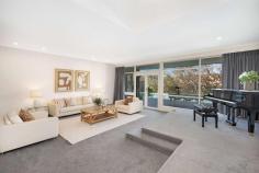  12 Athlone Crescent Killarney Heights NSW 2087 A striking masterpiece on 777sqm (approx.), this luxuriously appointed residence delivers an enviable lifestyle opportunity for discerning families who love to entertain. Exuding a chic aesthetic fused with high-calibre finishes, its stunning array of fluid living spaces and abundant oversized accommodation options provide the ultimate haven for growing families. With a brick façade and large lawn, the property's resort-inspired alfresco spaces spill out to the solar heated pool and Garigal National Park just beyond with outstanding bushland views. Positioned in a tightly held enclave, mere footsteps to walking tracks, it's a short stroll to Killarney Heights High School and just 1km to the village shops and café culture. Large open plan living areas perfect for entertaining guests Designer kitchen equipped with Miele appliances and Caesarstone benchtops Induction cooktop, Carysil sinks, concealed laundry and custom walk in pantry All-weather entertaining deck overlooks the solar heated pool and bushland Multiple living zones including a formal dining room and family room that opens to pool Three bedrooms on ground level including Master with ensuite and pool access Two spacious bedrooms plus a bathroom upstairs, perfect as a teenage retreat Downstairs bathrooms have been renovated, main features a freestanding bath Summer air-conditioning and under floor winter heating for year round comfort Footsteps to Magazine Track and Bates Creek, 1.1km walk to Killarney Hts High Quiet bushland pocket with easy access to the area's shopping and transport Extensive storage and built-ins for the needs of a large family home Solar heated saltwater pool adjoins sunny decks for alfresco entertaining Rainwater tank to serve easy care lawns and pool 