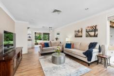  20 Nelimah Cl Narara NSW 2250 Tucked away in a blissfully peaceful cul-de-sac in a highly sought-after pocket of Narara. Presenting an immaculate, picture-perfect single-level home offering low-maintenance, simple living at its very best. Quality-built and thoughtfully upgraded, beautiful interiors offer a light-filled haven of relaxation, combined with a neutral colour pallet. The stunning kitchen with a free-flowing floor plan spills out to an inviting, expansive covered alfresco area with beautiful travertine tiles, all overlooking the lush soft grass and native gardens, attracting birds. It is the perfect place to sit back, relax, and unwind after a busy day with a cuppa or a glass of wine and listen as they sing, chirp, and chatter. The location is a dream, with an easy walk to the very popular St. Phillips Christian School and the local park. Quite simply, a perfect package for an array of buyers – A must to see! Features include: – Quality-built brick and tile residence that is immaculately presented inside and out. – Three generously proportioned bedrooms, two with built-in robes. – Open-plan living and dining area, beautifully bathed in natural light and perfectly set, spilling seamlessly out to an expansive covered alfresco area, gardens, and beyond. – Sleek kitchen with gorgeous stone bench tops, crisp white cabinetry, and an abundance of storage, including a butler’s pantry combo with laundry, stainless steel appliances, and a natural gas cooktop. Set perfectly with a beautiful outlook across the al fresco entertaining to the landscaped backyard.  – Modern, fresh, and naturally lit bathroom with a separate bath/shower and toilet. – Outdoors is a peaceful oasis, offering the ultimate entertainer all year round, with the outdoor covered patio alfresco area opening out from the dining room. It is simply perfect for catch-ups and BBQs with family and friends. All overlooking the lush, softly grassed, landscaped, and fully fenced rear yard. There is ample room for the kids and pets to play on the swing set, trampoline, and soccer ball. Or, for avid gardeners, plenty of space for veggie patches too. – Single auto lock-up drive-through garage + double gated side access to the backyard, perfect for the extra toys; off-street parking for the boat, camper, trailer, etc. Extras: NBN connected, ducted air conditioning throughout, natural gas heating, cooking, and hot water; ample storage inside and out; and a storage shed. All set in an incredibly highly sought-after and convenient location, offering easy access to an array of schools, including within walking distance to the very popular St. Philips Christian School, bus and train, Gosford CBD, waterfront, cafes, and hospitals. For commuters, easy access to the M1 for access to Sydney and Newcastle, along with the University of Newcastle (Ourimbah Campus), Westfield Tuggerah, and Erina Fair, all within 15 minutes. Adding to all of this is a selection of beautiful beaches and bushwalks, all within 20 minutes. 
