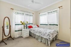 6 Wenlock Close MOUNT SHERIDAN QLD 4868 $600,000 Sitting proudly amongst other quality homes in the heart of Forest Gardens Estate sits this magnificent Queenslander-style home. With expansive East, and Southeast views from the back entertaining deck that will leave you feeling relaxed and at home. Built in 2007 with stainless steel frames and hardy plank external walls, this home speaks of quality and retains all of the best features of an original Queenslander, capturing the cool breezes year-round. Comprising, but not limited to: * Double-door entry to the air-conditioned open-plan living/dining room, lots of natural light and Cyprus pine flooring create a welcoming vibe. * Full-sized kitchen with centre island bench for extra prepping space. * High ceilings, security screened and to save money a 6.5KW solar power system. * Master bedroom with air-conditioning, walk-in robe, ensuite and French doors opening out to the Juliet balcony. * Bedrooms two and three have built-in robes. * Fourth bedroom is linked to the dining area and is currently used as an office. * The rear back patio deck is great for entertaining or relaxing with your morning cuppa. * Internal stairs take you downstairs to the work area, storage room, laundry and garage. * Gazebo and Spa complete the entertainment. * A fenced 629m2 block of flat land with immaculate established gardens and lawns. Located just a short walk from Monsoon Terrace Park and only a three to five-minute drive to Mount Sheridan Shopping Plaza, T.A.S Private School, St Mary's Catholic College, Cairns Golf Course and access to the Bruce Highway. 