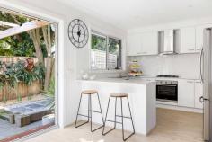  2/33 Genista Street Frankston South VIC 3199 $790,000 - $869,000 Step into a world of modern style and sophistication with this thoughtfully designed three-bedroom, two-bathroom residence, ideally situated within the prestigious Frankston High School zone. This property is tailor-made for those who crave low-maintenance living while savoring the luxury of a tranquil location. Upon entry, engineered wide-board timber flooring guides you through the ground floor, unveiling a stunning living and dining area that seamlessly connects to an entertainer's dream backyard. Slide open the glass doors to embrace the refreshing sea breeze and bask in the afternoon sun. The gourmet kitchen, tastefully appointed for any occasion, beckons with its stone benchtops and stainless steel appliances, including a gas cooktop and dishwasher-an ideal setup for both indoor and outdoor dining. Completing the ground floor is the master bedroom, complete with a walk-in robe and a private en-suite. Head upstairs to discover the well-arranged sleeping quarters, where two additional bedrooms with built-in robes await, along with a gleaming family bathroom. Additionally, there's a separate living room, perfect for providing the kids with their own space. Offering absolute privacy and a design that welcomes an abundance of natural light, this nearly-new townhouse defines contemporary coastal living. You'll also appreciate the convenience of a powder room on each level, split-system heating and cooling, low-maintenance outdoor areas, a garden shed, and a water tank. Strategically positioned to enjoy the best of Frankston's waterfront amenities and lifestyle, this property is just steps away from Beauty Park, Frankston's bustling CBD with its thriving entertainment district, public transportation options, and excellent schools. 