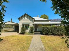  719 Ruthven Street South Toowoomba QLD 4350 $780,000 Great example of a by gone era, beautiful spacious home with all the classic features of a genuine Queenslander. VJ's throughout, 12 foot ceilings, hoop pine timber floors, 3 large bedrooms, lounge room, open fireplace, open plan kitchen-dining & living, L - shape front verandah - north easterly aspect, large rear timber deck under roof. Situated just a short distance from the CBD & all major amenities. • Fully Fenced - Private Yard • Electric Front Gate • Rear Yard Vehicle Access • Exposed Aggregate Driveway & Paths • 7m x 9m Colourbond Shed ( Fully Powered - Ceiling Fans ) • 7m x7m Carport ( Lights - Ceiling Fan ) 