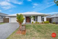  16 Watergum Close Sapphire Beach NSW 2450 $1,100,000 - $1,200,000 Welcome to your coastal haven in Sapphire Beach! This fantastic 4-bedroom, 2-bathroom home embodies the essence of relaxed coastal living. Nestled in one of the most coveted family-friendly neighborhoods, this property offers an idyllic beachside lifestyle that you've always dreamed of. With an inviting and neutral palette gracing both the interior and exterior, this home radiates tranquility. The open living area seamlessly connects to a spacious outdoor entertaining area, accessible through stacker doors. Whether you're hosting a family barbecue, savoring a morning coffee, or simply unwinding after a long day, this outdoor space is perfect for all your needs. Modern timber floors grace the main part of the home, infusing the space with warmth and character. The low-maintenance tropical gardens create a lush and welcoming atmosphere, ideal for weekend relaxation and playdates. In the heart of this home, you'll discover a well-appointed kitchen featuring stone benchtops, modern appliances, and a convenient walk-in pantry. It's a chef's dream, perfect for preparing family feasts or quick weekday meals. Nestled in the highly sought-after Sapphire Beach area, you'll discover the pristine beach is just a leisurely 5-minute walk away. Enjoy leisurely morning walks along the shore, family swims in the crystal-clear waters, or simply soak up the sun - the beach lifestyle is at your doorstep. Sapphire Beach is renowned for its family-friendly atmosphere, making it a perfect place to raise your children. Plus, you'll find local amenities, schools, and parks just a stone's throw away. Don't miss this unique opportunity to own your own slice of paradise in Sapphire Beach. With its modern design, low-maintenance features, and proximity to the beach, this property won't stay on the market for long. 