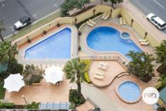  4E/5 Clifford Street Surfers Paradise QLD 4217 $765,000 This very spacious "E- Style" apartment located in the popular Dainford developed Peninsula apartment building is sure to impress with its size and updated interiors. This apartment will appeal to both owner occupiers or investors as there is a long term tenant in place wanting to stay on. Fully tiled large combined living and dining room Renovated kitchen with stone benchtops and dishwasher Renovated updated main bathroom with internal laundry Two spacious bedrooms with built ins and main with walk in robe and updated ensuite Generous full length balcony with some ocean views Resort building offering 4 swimming pools, a full tennis court, gym and a BBQ area Can owner occupy, be permanently leased or leased through the holiday letting services in the building. 