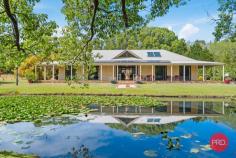  41 Bakker Drive Bonville NSW 2450 $1,550,000 - $1,650,000 Introducing a rare gem in Bonville! Nestled on an expansive 6255m2 parcel of land, this remarkable estate is a haven of natural beauty and architectural elegance. This stunning home comes with its very own private lagoon, creating a picturesque backdrop for your daily life. Enjoy the serene sounds of nature and the tranquility of your surroundings. As you step onto the property, a spacious wrap-around verandah welcomes you. It's the perfect place to unwind, enjoy al fresco dining, sip your morning coffee, or witness the breathtaking sunsets that Bonville has to offer. Inside, you'll find three generous bedrooms, each thoughtfully designed for comfort and style. Additionally, there's a convenient study that can serve as your home office or a quiet space for creativity. For those in need of extra space, there's a separate studio apartment with a kitchenette and bathroom. It's a versatile addition, perfect for accommodating guests or even generating rental income. The interior of the house boasts ornate cornice, high ceilings, and feature windows that flood the multiple living spaces with natural light, creating an atmosphere of timeless elegance. Step out into your own private oasis, complete with a swimming pool, ideal for hot summer days and entertaining your family and friends. Practicality meets luxury with a laundry room that includes an additional toilet and shower, adding convenience and functionality to your daily life. The house itself is a masterpiece of sandstone coloured, block construction, offering both durability and charm. And that's not all; this property is equipped with a solar power system to save money on electricity and a bore to ensure you never run out of water. As if all of this weren't enough, this exceptional property is located less than 10 minutes' drive from the vibrant community of Sawtell and conveniently close to the prestigious Bonville International Golf Course, offering the perfect blend of natural beauty and modern convenience. Your dream home in Bonville awaits. Schedule a private viewing today to experience the magic of this remarkable residence. 