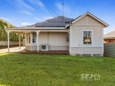  34 Farmers Road Dumbalk VIC 3956 $495,000 This much loved 100-year-old farmhouse in the heart of the peaceful rural village of Dumbalk offers town living and a backyard with the most gorgeous rural views across the paddocks to the hills beyond. All the big-ticket foundations of a home are in place here, having been re stumped, re wired, fully insulated, new roof, new septic, and a 7.2KW Solar system, to mention a few. Internally there is plenty of scope for the next custodian to put their personal touch on this charming home. Featuring: - Family and dining with feature box bay window and polished bamboo floors. - Galley style kitchen positioned to take in the rural farmland views with Stanley Waterford Range (wood burner with wet back) in addition to a 900mm Bosch pyrolytic electric oven, Bosch dishwasher and pine cabinetry. - 3 bedrooms with the master complete with ensuite and walk in robe. - The family bathroom has a separate shower, spa bath and vanity and separate toilet. - Storage is excellent with floor to ceiling pine built in pantry and linen press. - Daiken reverse cycle air conditioner, ceiling fans and the wood heater keep the home warm and cool all year round. Externally: - Spacious 935m2 block, fully fenced with new fencing and charming front fenced yard. - An excellent 10m x 4m garage providing car and workshop space. - Large concrete off-street parking area. - The garden is low maintenance neat lawns providing a blank canvas for those who love to create their own gardens, all the while enjoying the backdrop across the farmland. This home has so much to offer the first home buyer, retiree, or investor. Located 8 minutes' drive from the thriving village of Meeniyan, 16 minutes to South Gippsland's major township of Leongatha and centrally based to the Latrobe Valley or to the coastal beaches of Inverloch or Waratah Bay. 
