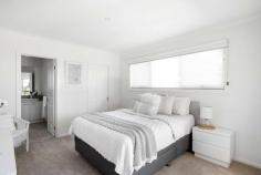  2/33 Genista Street Frankston South VIC 3199 $790,000 - $869,000 Step into a world of modern style and sophistication with this thoughtfully designed three-bedroom, two-bathroom residence, ideally situated within the prestigious Frankston High School zone. This property is tailor-made for those who crave low-maintenance living while savoring the luxury of a tranquil location. Upon entry, engineered wide-board timber flooring guides you through the ground floor, unveiling a stunning living and dining area that seamlessly connects to an entertainer's dream backyard. Slide open the glass doors to embrace the refreshing sea breeze and bask in the afternoon sun. The gourmet kitchen, tastefully appointed for any occasion, beckons with its stone benchtops and stainless steel appliances, including a gas cooktop and dishwasher-an ideal setup for both indoor and outdoor dining. Completing the ground floor is the master bedroom, complete with a walk-in robe and a private en-suite. Head upstairs to discover the well-arranged sleeping quarters, where two additional bedrooms with built-in robes await, along with a gleaming family bathroom. Additionally, there's a separate living room, perfect for providing the kids with their own space. Offering absolute privacy and a design that welcomes an abundance of natural light, this nearly-new townhouse defines contemporary coastal living. You'll also appreciate the convenience of a powder room on each level, split-system heating and cooling, low-maintenance outdoor areas, a garden shed, and a water tank. Strategically positioned to enjoy the best of Frankston's waterfront amenities and lifestyle, this property is just steps away from Beauty Park, Frankston's bustling CBD with its thriving entertainment district, public transportation options, and excellent schools. 