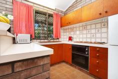  13 Copra Crescent Karama NT 0812 $450,000 Arriving at this home, you are greeted by the most glorious, lush, tropical gardens. Lovingly cared for, these well-established gardens are simply a joy to behold. You'll see an ample lawn to the front and the rear garden is vast making for a dream family enclave. With parking for 2 cars, step inside the cool of this solid brick home. Entering the bright living space, you will be struck by the high ceilings and immaculate order of this property. While there is potential to modernise this space, it is in move in condition and prepared to host family life. The open plan living and dining area adjoins the neat kitchen, all with views to the beautiful rear garden. The kitchen is perfectly positioned to oversee any smaller family member's activities, both indoor and out. From the living area, sliding doors lead to a peaceful verandah extending the length of the home. Great for dining or just relaxation and overlooking the stunning lawn. Stepping back inside, we visit the first of three bedrooms. This room with built in robe, ceiling fan and air-conditioning offers the perfect position to function as a work from home space or study. Bedroom two is similarly appointed and sits opposite the main family bathroom. While this bathroom boasts original features and a separate WC, you will see potential to add your personal touch here. The master suite is bright and airy, with generous proportions, built in robes and ensuite. The laundry is conveniently located next to the main bathroom and offers its own entrance to the garden, giving easy access to the paved drying area with Hills Hoist. Just moments from the Casuarina Shopping Hub and close to university and hospital, this original owner-occupied home is primed to become a much-loved family residence. 