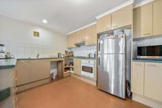  10A Westgarth Street O'Connor ACT 2602 This dual occupancy home is located in a fantastic tree lined street within walking distance of the O'Connor shops, schools, ANU and is a 15 minute walk to the CBD. The home features three bedrooms, the master is segregated upstairs and has a walk through robe plus ensuite. There are separate living and dining spaces, a slow combustion heater in the living area, large kitchen with ample storage, plus a single carport. This is a great opportunity to retrofit Passive House Standards to an existing dwelling with architectural features, in the superior location of O'Connor with superb proximity to lifestyle amenities. Long term tenants in place on a month by month basis. • 	 North facing orientation to capture the sunlight and utilise radiant heat principles from the tiled floors in winter • 	 Double height entry space inside the front door • 	 Versatile floor plan with separate living and dining spaces • 	 Spacious kitchen with great storage • 	 A slow combustion heater with two storey internal flue to maximise heat production • 	 Three separate zones of underfloor heating • 	 Parent retreat upstairs with ensuite, built in wardrobes overlooking the garden and courtyard to the north plus solid timber floors • 	 Two carpeted downstairs bedrooms with built in wardrobes • 	 Downstairs main bathroom with separate toilet.. 
