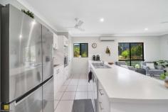  4 Mcsweeney Crescent Gordonvale QLD 4865 $498,000 Therese Plath is excited to present this well-appointed and immaculately presented home offering the perfect setting for a private and comfortable family lifestyle. This light filled and contemporary home offers quality lifestyle a perfect example of low maintenance living. This fully air conditioned residence which has every feature the growing family desires with spacious open plan design. Offering easy care on one level and featuring a clever floor plan which caters for all and perfect for our tropical Queensland climate. The galley style kitchen is practical and superbly appointed with electric cooktop and oven, dishwasher, built in pantry and ample bench and cupboard space plus an island bench that provides both plenty of food preparation space, and an eating place for your family and guests. Sliding doors create a seamless flow from the open plan kitchen, dining and lounge. All of this spacious living opens onto the entertaining alfresco area, overlooking the low maintenance tropical garden. For those moments of reflection, a separate formal lounge room awaits. All the generous bedrooms have vinyl with the master bedroom offering en-suite and the other three bedrooms having built-in cupboards. The main family bathroom has single vanity, plunge bath and shower. Many other features include: • 	 Fully air conditioned throughout • 	 Tiled living areas and vinyl flooring to bedrooms • 	 Built ins to all bedrooms • 	 Security screens and ceiling fans throughout • 	 Two car remote car accommodation providing secure parking for your vehicles • 	 Linen cupboard storage • 	 Internal laundry • 	 Garden shed • 	 Room for your boat or caravan at front • 	 Low maintenance and established gardens • 	 Any many, many more features ….. A secure landscaped backyard, complete with garden shed offers peace of mind and plenty of room for a swimming pool and ample space for children's swings and pets to enjoy. For those considering an investment, this property promises an attractive rental return. Secure your home before Christmas and to know more or to view this property, please call Therese Plath on 0418 772 995. 