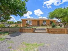  1 Muscio Place Chisholm ACT 2905 $800,000 Looking for a large block ? This is it.... ! Angled across the block this privately built 3 bedroom house has a renovated kitchen (2018) and an as new bathroom and is ready to purchase NOW ! The potential for this property is unlimited. Dual access, double brick garage (2 remote auto doors), large covered rear pergola. Features * 1134 sqm block * 3 bedrooms * Renovated kitchen (2018) stone bench top lots of cupboards * Fully tiled bathroom (new 2023) * Carpets, blinds recessed lights * Ducted gas heating * Wall air conditioner in dining area * Separate toilet and laundry * Large covered rear pergola * Small covered pergola at side * Fully enclosed rear with colour bond fencing * Double garage with auto remote on both doors Very easy access to Chisholm Primary, Caroline Chisholm High and local shops. 