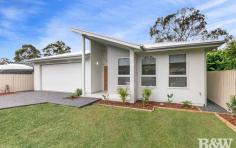  21 Kallaroo Rd Umina Beach NSW 2257 $2,050,000 - $2,150,000 Set in the highly desirable south Umina Beach, this brand-new master built home offers single level, modern family living showcasing many unique elements that you can’t help but appreciate. This is a home that oozes space, quality, privacy and needs to be inspected to gauge the size and see the attention to detail that has gone into making the house a home. Positioned on a level block and a flat walk to the Umina Beach shopping precinct, patrolled beaches and situated in the sought-after Umina Beach Primary School catchment, this home has so much to offer. It truly is a great piece of real estate you will want to get your hands on. Upon arrival to this magnificent home, you are greeted with a automatic gate, this takes you to your secure off street parking options and into a supersized automatic double garage. The garage has internal access to the property and fitted mudroom. Step through the front door and you are welcomed into the sun-soaked formal living room. Proceed through the home to the spacious kitchen where you will find a large walk-in style pantry, 40mm Caesarstone, soft close draws and cupboards, 900mm SMEG appliances, breakfast bar and timeless brushed nickel fixtures and fittings. The Kitchen overlooks the open plan living and dining rooms which leads out to the large alfresco entertaining area and private garden. The master bedroom is magnificent! generous in size and fitted with a custom designed walk in style wardrobe, study nook and stunning ensuite bathroom. The fit out is everything you would expect in a home of this quality. This home contains an additional 3 good sized bedrooms, all with ceiling fans and built-in wardrobes. Both the ensuite and main bathroom are as luxurious as you would expect. Both containing, underfloor heating, featuring floor to ceiling tiles, modern wall hung vanities with stone tops and soft close drawers, finished with brushed-nickel fixtures and fittings. The main with additional free-standing bathtub and frameless shower screen. You will be blown away by the endless storage options throughout this home. It really needs to be seen to be understood. The home includes a large 9kw ducted air conditioning system with 3 zones for constant comfort all year round as well as an alarm system. The flooring consists of a beautiful modern oak timber laminate in the communal spaces and luxurious carpet in all the bedrooms. Set on a 578.50sqm lot, the thought that has gone into the design of this home has focused on convenient living, down to having USB points in the Master bedroom and kitchen. With so much more to explore this home needs to be inspected to be appreciated, contact Rachel Potter on 0403 580 988 to arrange your inspection. Your new home awaits! Distances to note: • Umina Beach SLSC, approx 1.5km • Umina Beach primary school, approx 1.3km • Umina Beach shopping precinct, approx 1.6km • Umina Beach sporting Oval, approx 1km • Umina Beach bowling club, approx 1.2km • Woy Woy train station, approx 6.4km • M1 Pacific Mwy, approx 16.4km 