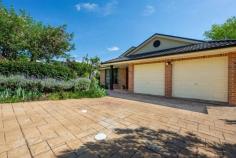  29D Birriga Ave Bundanoon NSW 2578 $995,000 A well positioned residence down a quiet private road set amongst an established garden ensuring privacy, an abundance of bird life and plenty of sunshine. A fabulous versatile floor plan for the whole family, downsizers and entertainers. High points The home is configured as a four bedroom with two well sized and appointed bathrooms, the master suite well away from the family / guest wing. Excellent storage options in all bedrooms. Offering substantial living options with the newly renovated kitchen centrally located to flow from both the casual living, dining space to the cosy more formal spaces and the outdoor entertaining terrace making it a great family home. Quality finishes in the kitchen with funky glass splash back, stone benches and excellent storage options. New engineered flooring to the kitchen / family space with carpet throughout the remainder of the residence. Gas ducted heating and all town services available and connected. The double garage offers internal access to the entry hall plus there is further space for two more vehicles in the driveway. An added bonus is the newly constructed studio in the rear garden, perfect for teenagers, work from home space, artist studio or workshop. The lawn free property offers an established selection of ornamentals, shrubs with various garden beds and a huge selection of fruit trees perfect for jam making. The rear enclosed veggie garden is also well placed and bathed in sunshine with the chook house / run an added bonus. A thoughtfully designed working garden. An immaculate property for the whole family or those who love to entertain, call to arrange your private inspection. 