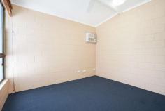 2/12 Gotham Street Leanyer NT 0812 $298,000 Set back from the street within a small complex of six, this neat two-bedroom unit offers low maintenance living in a convenient location, just a short walk from Hibiscus Shopping Centre and Hibiscus Tavern. Perfectly functional as is, the unit could provide the potential to add value with some updates, while making the most of its great outdoor space and inground pool. • 	 Peaceful location within boutique complex (which is pet-friendly with Body Corp approval) • 	 Effortless, low maintenance living perfect for couples, downsizers and first home buyers • 	 Neat, comfortable layout provides potential to add value with updates • 	 Open-plan living opens out to covered verandah at rear • 	 Private courtyard features great-sized pool and minimal maintenance • 	 Kitchen features electric stove, ample storage and breakfast bar • 	 Larger master offers built-in robe and views over pool and courtyard • 	 Second bedroom also features built-in robe • 	 Smart central bathroom with walk-in shower and integrated laundry • 	 Single carport at front with covered access to interior • 	 While it may be in need of a little love, this unit would be perfect for buyers looking to carry out a few updates, to then live in as their first home, to downsize into, or to rent out. As is, the unit delivers low maintenance living within an effortless layout, which is centred around a bright open-plan living area. Overlooked by a neat kitchen, this space flows out easily to a covered verandah through two sets of sliding glass doors. Given its size, the courtyard still offers up a good-sized pool, framed by full fencing for perfect privacy. As you would expect, there is very little maintenance to worry about out here, but the space could easily be enhanced by some greenery. In terms of sleep space, both bedrooms feel generous in size, with built-in robes to each. A smart bathroom with walk-in shower and integrated laundry is handily located between the bedrooms. Completing the unit is a single carport at the front. As for location, you can walk to Leanyer's preschool and primary school, as well as nearby parks and the local shops and tavern. It's also just a short drive to Casuarina Square, the university, the hospital and Casuarina's spectacular coastline.. 