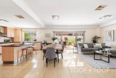  42 Dyott Ave Hampstead Gardens SA 5086 $1,050,000 - $1,150,000 An extremely rare and unique opportunity to acquire this stunning 2008 built family residence in an enviable location ideally suited for the largest of families &/or extended family to comfortably reside…. From its grand and imposing street frontage to the coffered ceiling entrance hallway, this home is sure to provide an unforgettable impression to all who walk through the front door. Positioned on a corner allotment of appox. 472sqm of land, the lower level is extremely versatile and incorporates spacious casual and formal living areas including the rear open plan family/meals area which is overlooked by the kitchen. This also leads out through double sliding doors to the low maintenance and expansive rear paved undercover area. The centrally located and spacious kitchen with breakfast bar looks out over the family & meals, and includes all the wants and needs for the chefs of the home. Beautiful granite bench tops, ample drawer and cupboard storage with endless bench space comes together very nicely with a 900mm stainless gas cooktop, oven, range hood & dishwasher. Completing the lower level is the second master suite with walk-through robe into the en-suite. Directly opposite this is the enormous formal lounge and dining area, which could potentially be closed off to make 2 separate rooms inc. another bedroom, study/office and/or another living area as well. Making your way up the stairs to the first level, you’re pleasantly greeted by another separate living/family space. The master suite is pure luxury and space, with your own private balcony to take in the views of the Adelaide foothills. Enormous walk-in robe takes you through to the luxurious en-suite with corner spa bath and separate toilet. The remaining 3 bedrooms are of a very generous size and include built-robes with easy access to the 3 way bathroom. Great features of this home include; Ducted reverse-cycle air-conditioning throughout. Double auto panel lift roller doors with rear and internal access. 16 panel and approx. 2.9kW solar system. Low maintenance front & rear yards with part manual irrigation. 17,500L rainwater tank plumbed to the home. 3,000L rainwater tank plumbed to the kitchen. Enormous laundry with great storage and bench space. 4th toilet/powder room on lower level. Ceiling fans to bedrooms 1 & 2. Under stairs storage. Security system. This immaculate family home is beautifully located with easy access to so many different ammenities inc. public transport, Doley Reserve, Hampstead Primary School, Klemzig Primary School, Greenacres Shopping Centre, Gaza Sports and Community Club, O.G. Hotel, multiple restaurants and cafes and is superbly located so close to Child Care centres, beautiful parks, multiple playgrounds with approx. 15 minutes to the vibrant restaurants & cafes of North Adelaide & the Adelaide CBD. Please contact Scott Thomson on 0414 427 427 for further information. 
