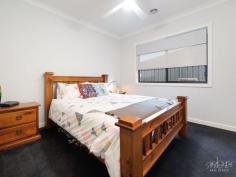  35 Saffron Cct Baranduda VIC 3691 $969,000 Thoughtfully designed throughout and with enough room for the whole family, this beautifully presented home is sure to tick all your boxes. Situated in the highly sort after and family friendly Baranduda, be impressed by this homes functionality, immaculate street appeal and of course, the sparkling inground swimming pool and huge powered shed! The master suite of the residence is privately positioned to the front of the home and features a stylishly appointed ensuite with dual basins and generous walk in robe. A further three bedrooms all have built in robes and share the full family bathroom. Two living areas cater for the largest of families and include a light and bright open plan family and meals and a separate formal lounge. An office has your working from home needs covered or could also be utilized as a third living or bedroom for when guests come to stay. The entertainers kitchen is the core of the home and features stainless steel appliances including 900 freestanding stove and dishwasher, stone benchtops, a cleverly concealed walk in pantry and an extensive island bench. With your comfort in mind, the home has been fitted with evaporative cooling, ducted gas heating, ceiling fans to all bedrooms and quality day/night blinds throughout. A 6.6kw solar panel system will also assist in keeping your bills to a minimum. Sliding doors provide seamless indoor-outdoor flow to the covered alfresco where you can entertain with ease. Relax after a long day in the solar heated swimming pool or simply enjoy watching the kids and pets play in the manicured grounds and gardens complete with irrigation system and a selection of beautiful fruit trees. The double garage will accommodate your vehicles and offers both remote and internal access. Dual gates to the side of the property provide exceptional access to the rear yard where you will find the whopping 6.5m x 15m powered shed complete with roller doors and evaporative cooling, perfect for tradesmen or car enthusiast. Additionally, there is a covered caravan bay with access available from Kiewa Valley Highway. Within a short walk to the recently completed IGA supermarket, General Store, Community Centre and Primary School as well as being only a short 10 minute commute to the CBD of Wodonga, 