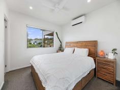  1/7 Moss Day Place Burnside QLD 4560 This quality built, contemporary home is located in a premium residential enclave surrounded by modern homes on generous sized blocks, only minutes from shops, schools and medical facilities. The single level, 3 bedroom home offers low maintenance living at its very best. Sitting on an elevated block, you will be spoilt for choice when it comes to admiring stunning hinterland views. Indulge in a relaxing evening on the deck with friends and family as you watch the sun set or herald the tranquillity of a new day with your yoga mat or morning coffee. Boasting 2.55 metre ceilings, easy care hybrid flooring, fans and split system air conditioners in each of the carpeted bedrooms there is nothing to do here but move on in. A delightful contemporary colour palette along with floor to ceiling curtains in both the dining and living areas emphasises the light, airy appeal of the home. The main bathroom offers both a large bath and shower while the master bedroom includes a modern ensuite and double sliding robe with mirrored doors. Floor to ceiling tiles in both bathrooms will also appeal. The well-appointed kitchen boasts 40mm stone bench tops, gas cooking and stainless steel dishwasher. Enjoy the benefits of gas hot water. Secure internal entry to the double garage and laundry is located to the side of the kitchen. The large double garage also includes generous storage options behind sliding doors. The kids will relish the opportunity to play outdoors. The huge fenced block is children friendly and offers so many options... add a pool or perhaps utilise the 6 x 6m concrete slab to accommodate an additional shed should you wish. With Nambour Heights Shops only minutes away, this home is designed for effortless living with lifestyle, leisure and minimal maintenance at its cornerstone, you can look forward to simply moving in and making new memories. 