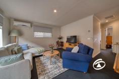  Unit 30/11 Hawk Ave Pakenham VIC 3810 $430,000 - $470,000 Positioned at the top of a private and elevated setting, be impressed with this modern and low-maintenance single-level home setting a new standard for contemporary, low-maintenance living. The floor plan begins with a spacious and light-filled open-plan living and dining area that adjoins a stylish kitchen hosting brand-new appliances including a dishwasher, plenty of storage, and ample bench space. Glass sliding doors connect out to the hassle-free backyard that currently presents a combination of pavement and stone. Accommodation comprises of two bedrooms, both great in size and equipped with double built-in robes. Both have easy access to the main bathroom and toilet. Additional benefits include ducted heating throughout, split system air conditioning, separate laundry, brand-new window furnishings, ceiling fans, and a remote single-car garage. Enjoy the convenience of being only a stone’s throw away from key amenities including shopping centres, supermarkets, local schools, and parks/reserves. 